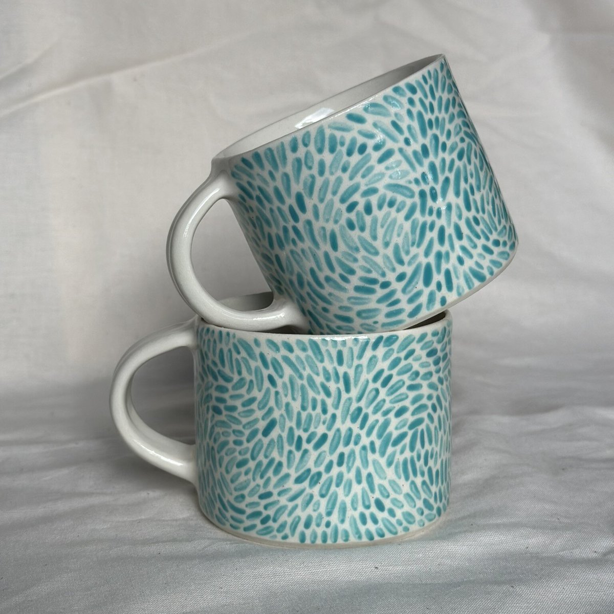 two six-ounce mugs